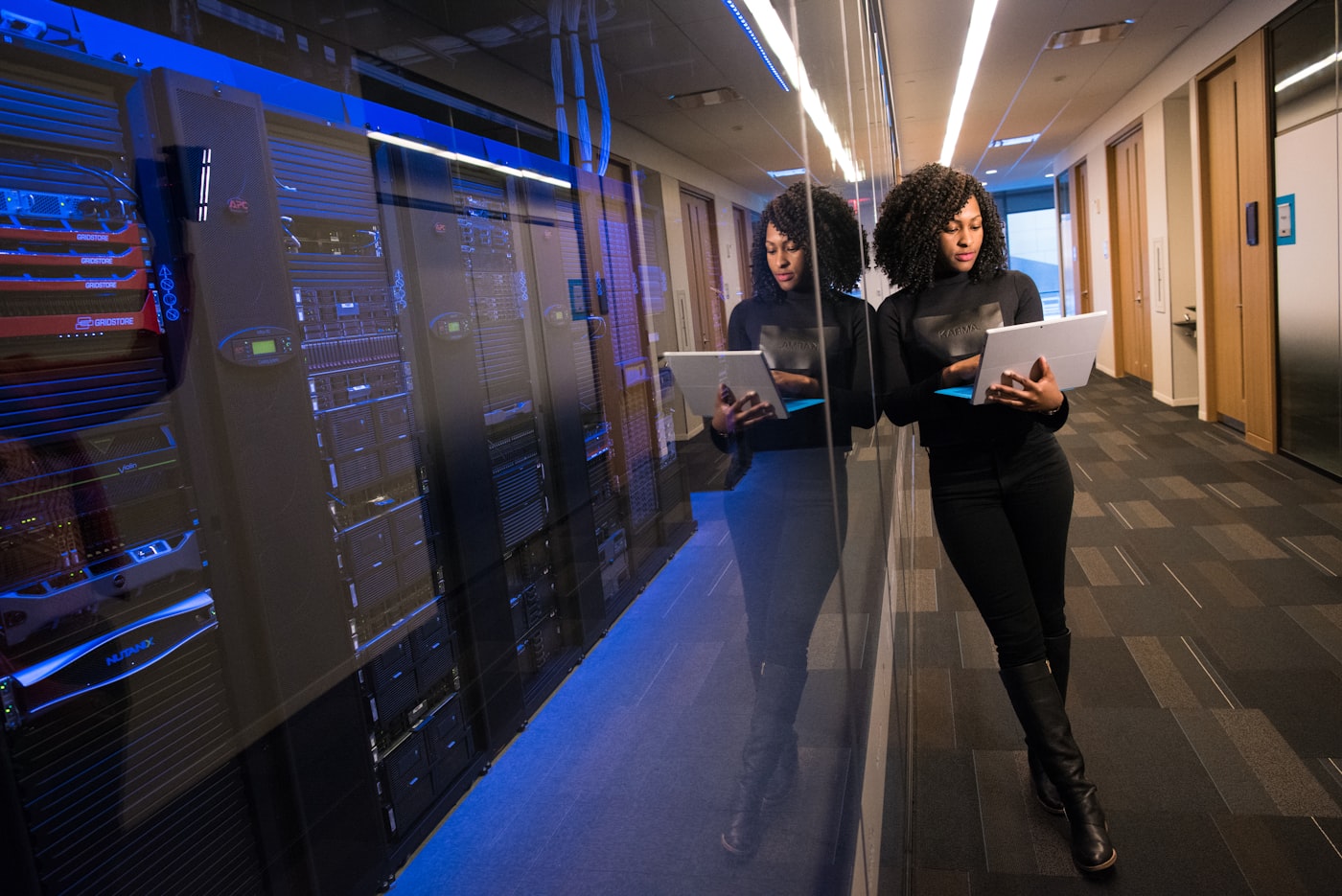 Corridor of server racks in a data centre